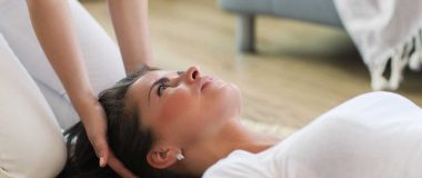 Woman is getting physical therapy from a professional doctor